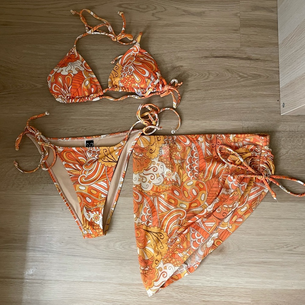 Orange swimsuit with bottom cover skirt
